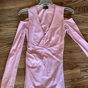 Mary crafts pink long sleeve with dress with shoulders out.